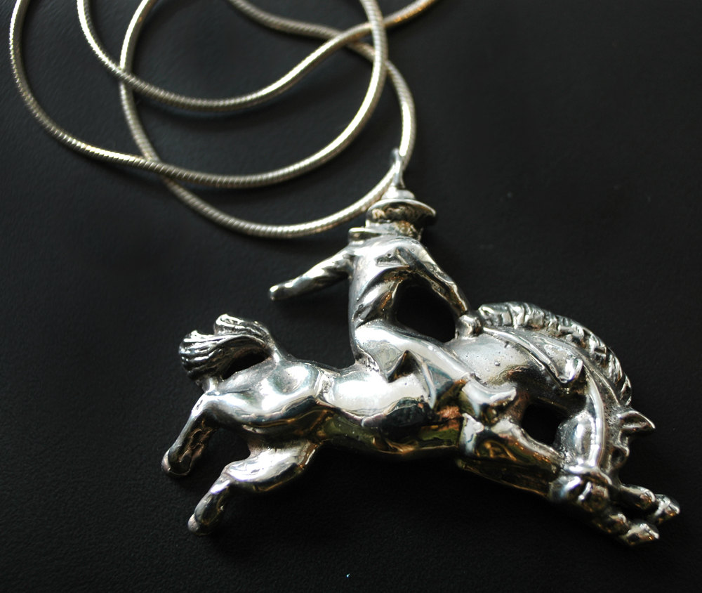 Cowboy on Bucking Bronco Necklace in White or Gold Bronze