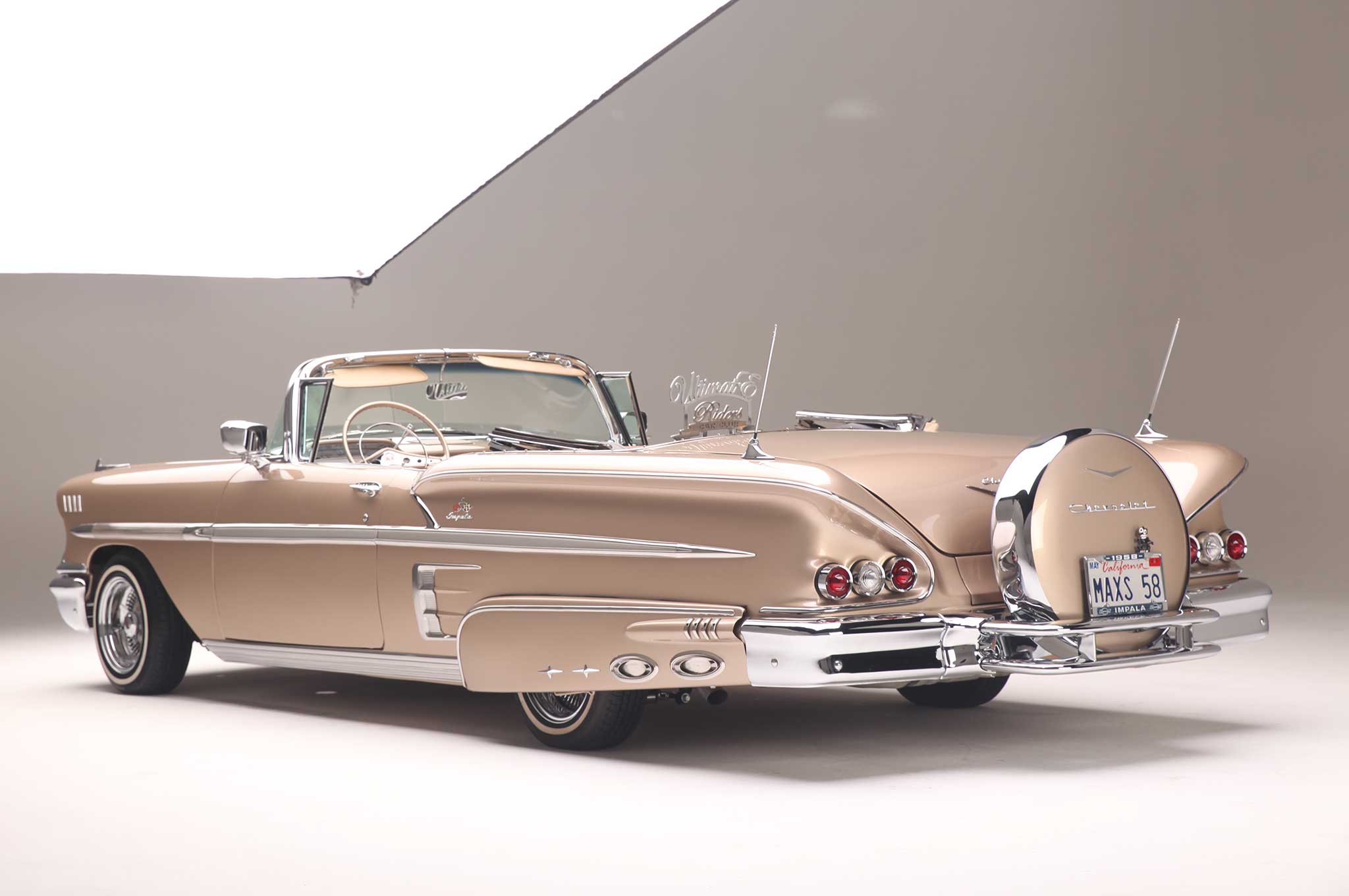 1958-chevrolet-impala-convertible-driver-side-rear-end-01.jpg